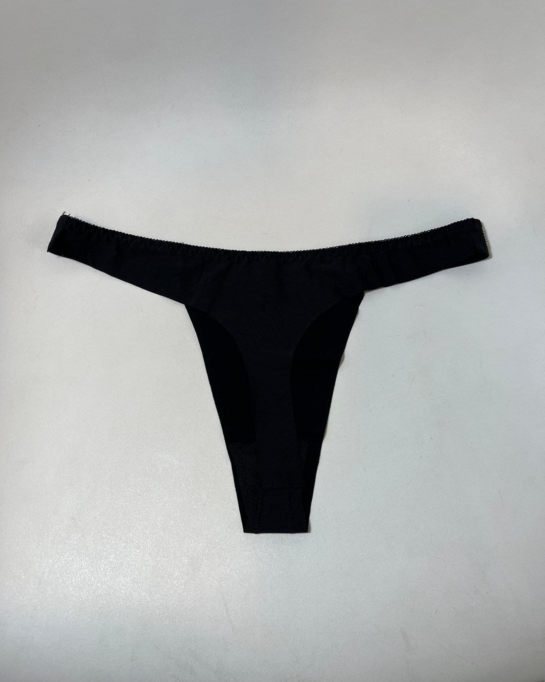 TANGA DE LICRA SIN COSTURA CON BRILLOS LOVE