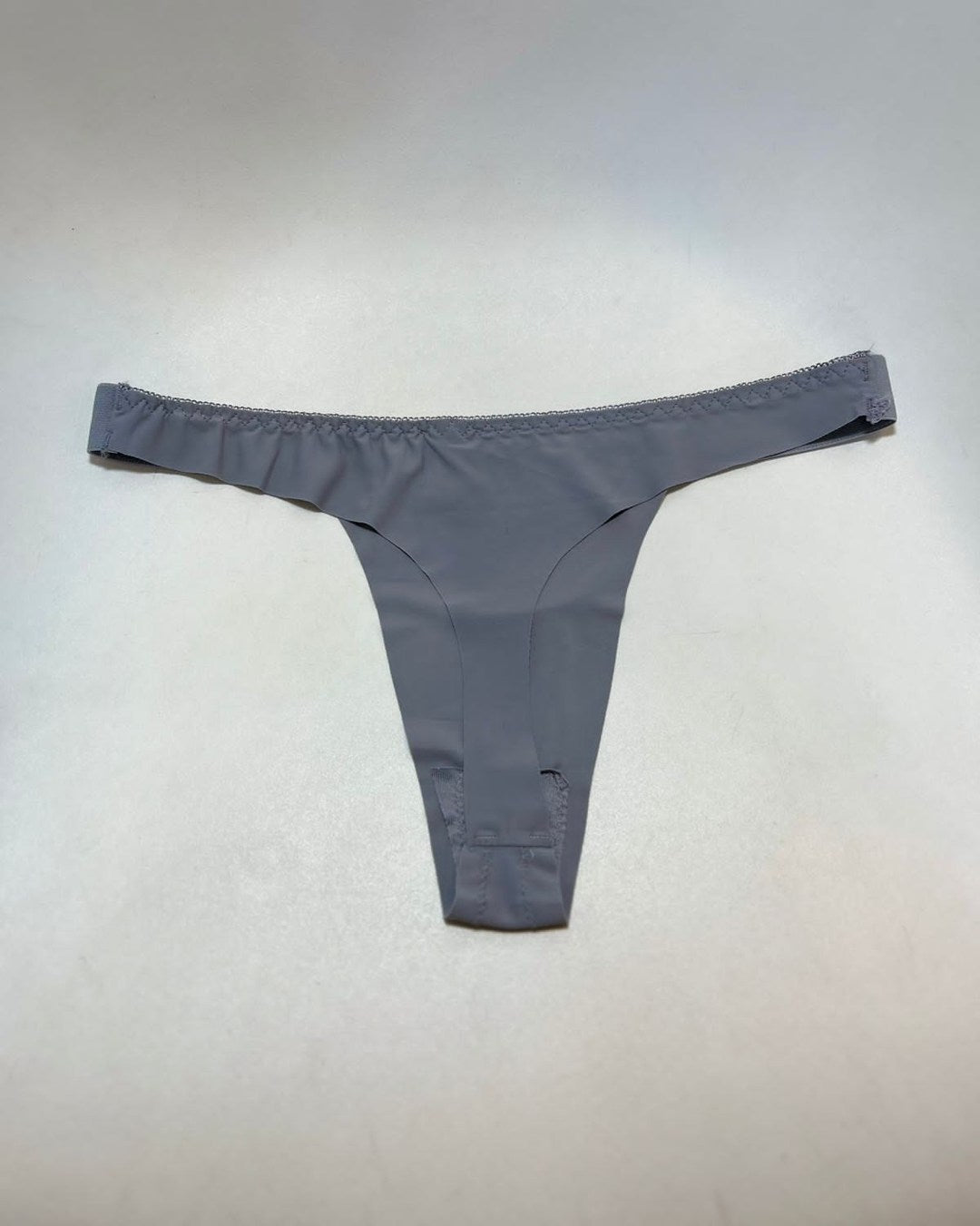 TANGA DE LICRA SIN COSTURA CON BRILLOS LOVE