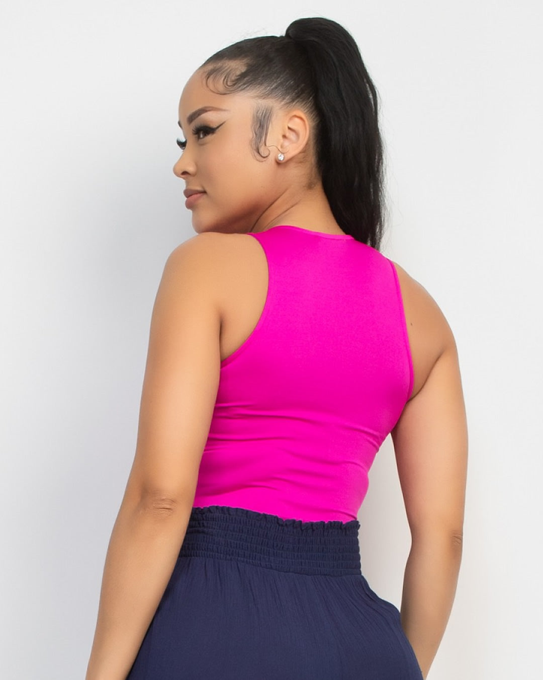 PANTIBLUSA DE LICRA SIN MANGAS ROSA