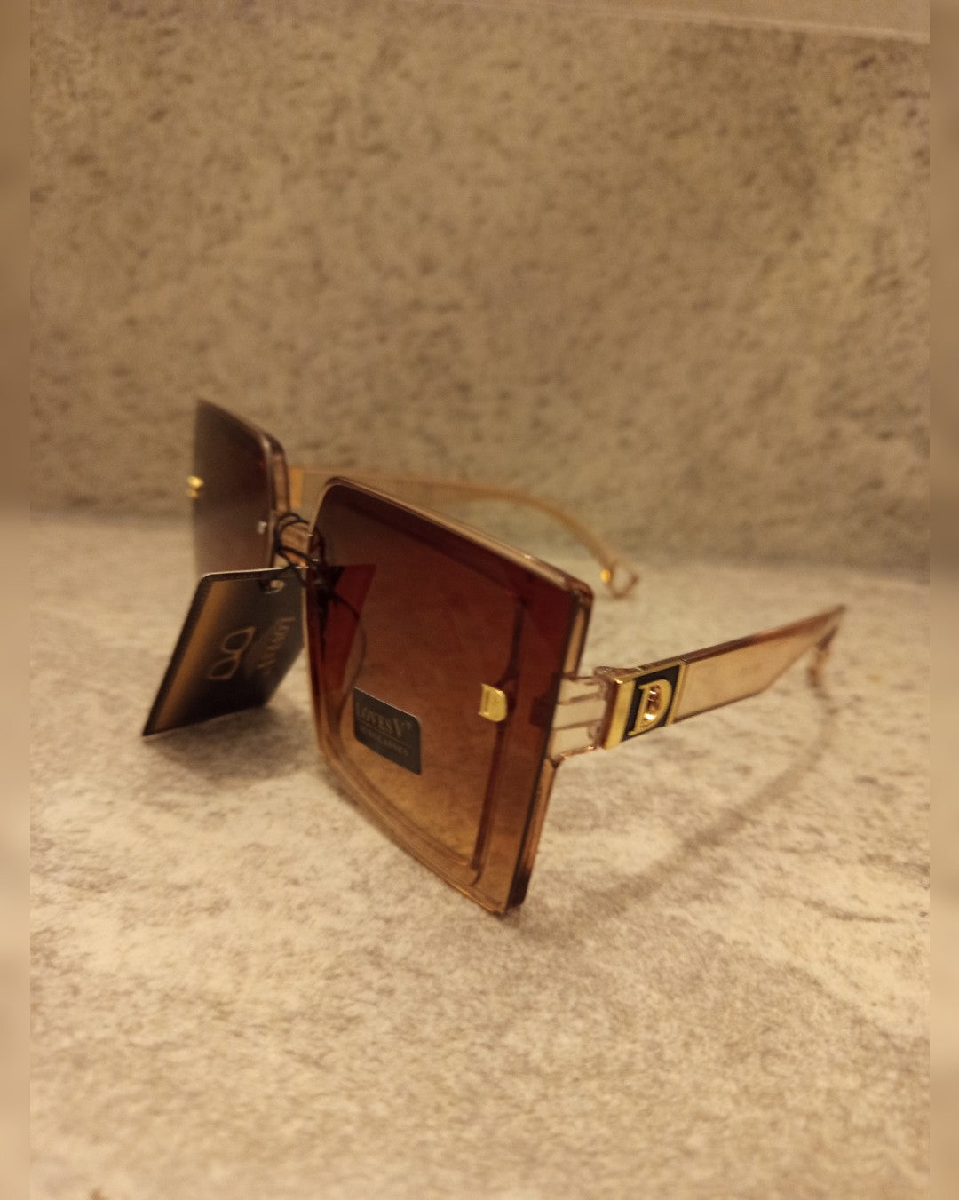 L048 LENTES DE SOL
