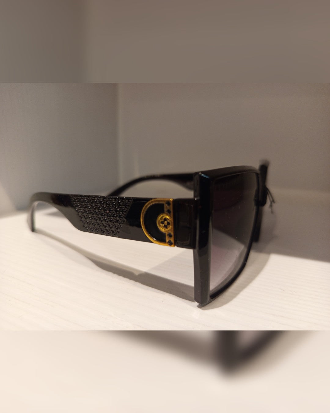 L040 LENTES DE SOL