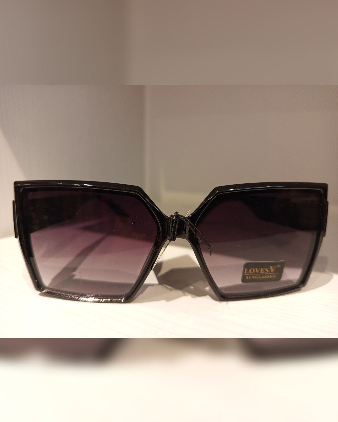 L040 LENTES DE SOL
