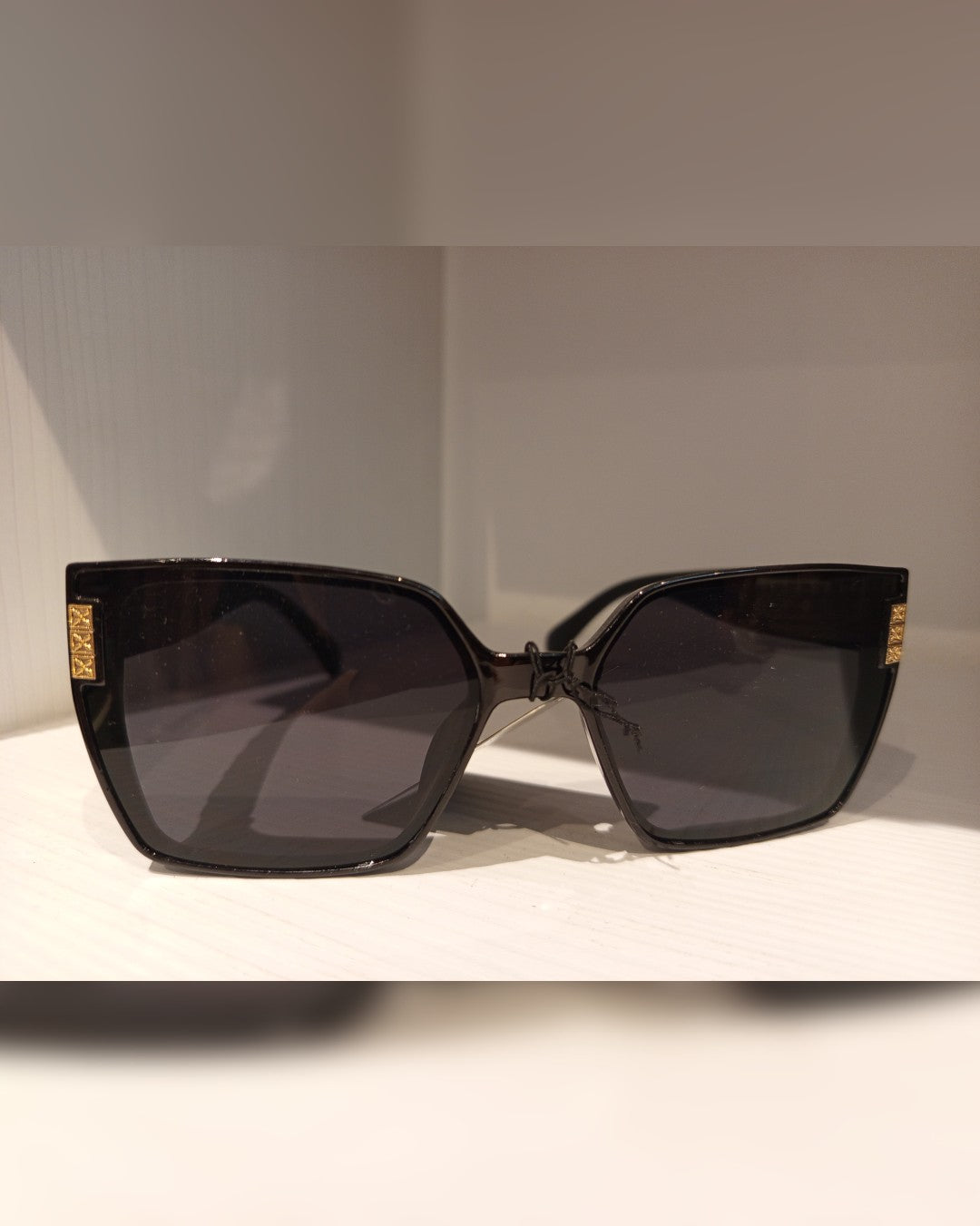 L042 LENTES DE SOL