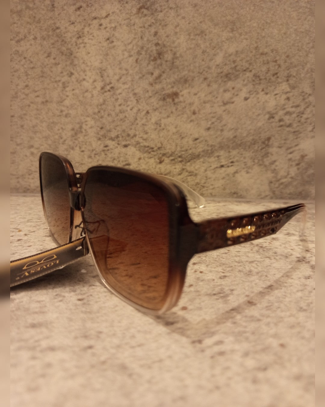 L056 LENTES DE SOL