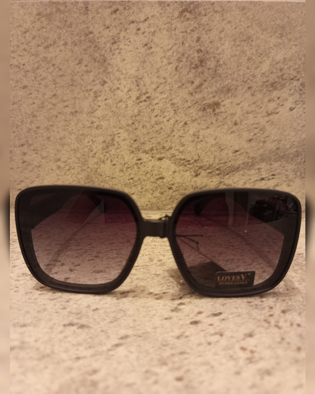 L057 LENTES DE SOL