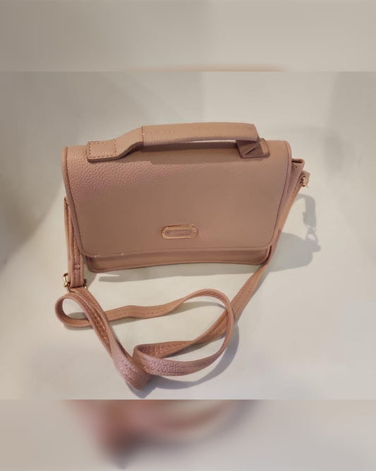 BOLSA CROSS BODY DE 20 CM DE ANCHO POR 16 CM DE ALTO COLOR ROSA
