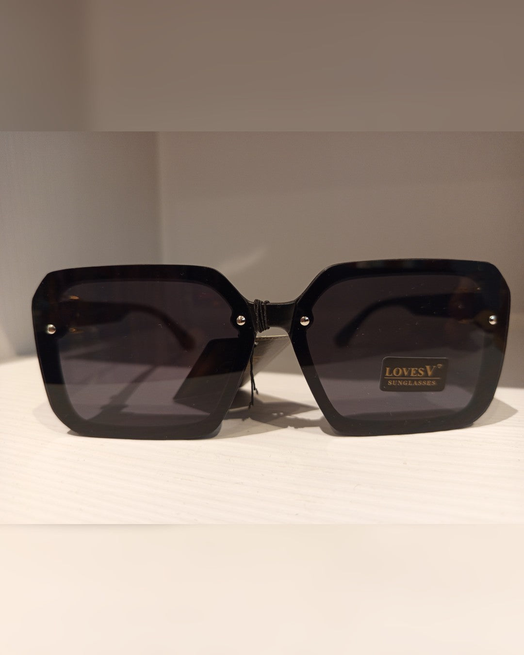L043 LENTES DE SOL