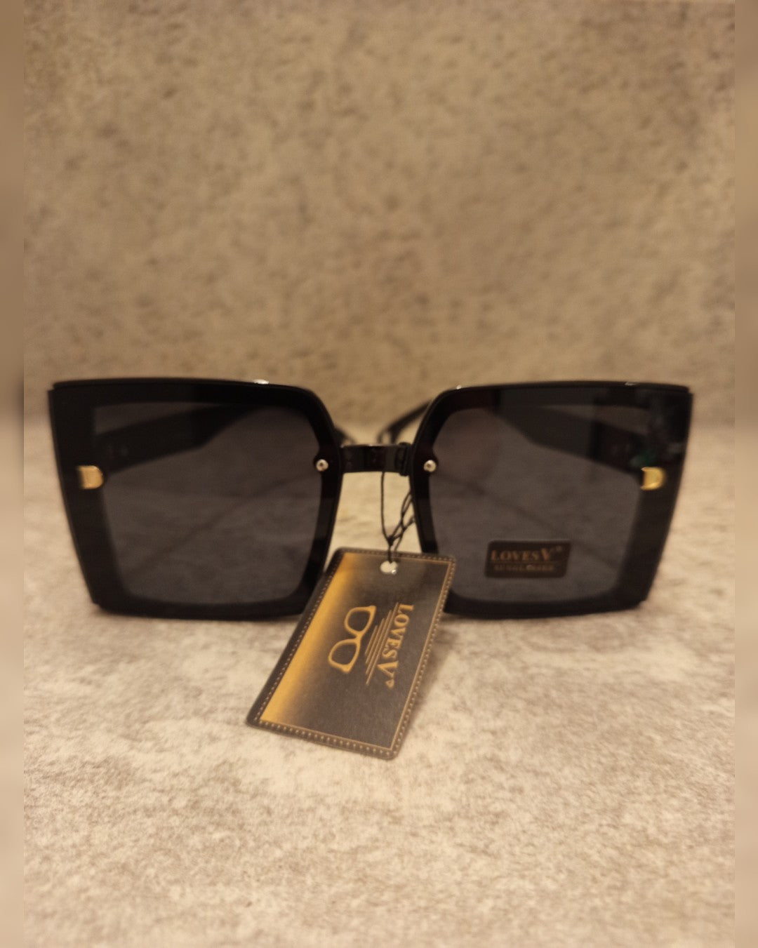 L049 LENTES DE SOL