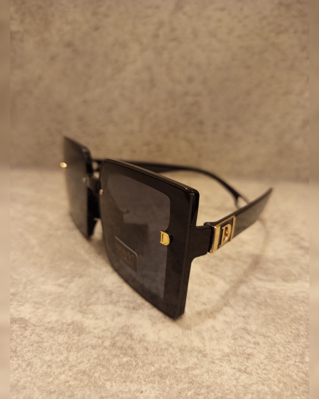 L049 LENTES DE SOL