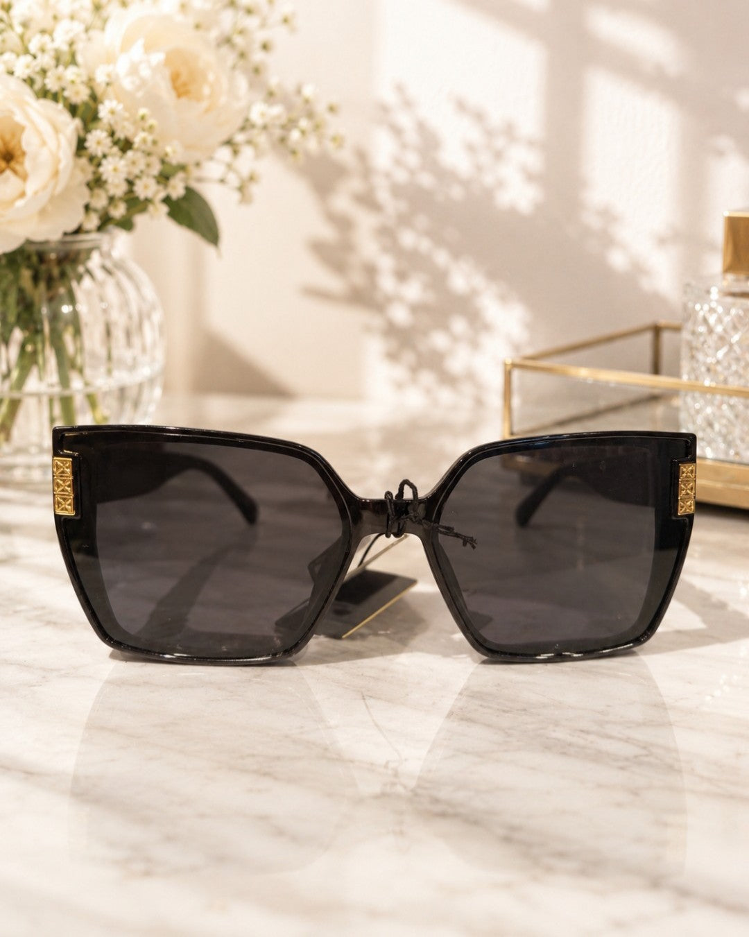L042 LENTES DE SOL