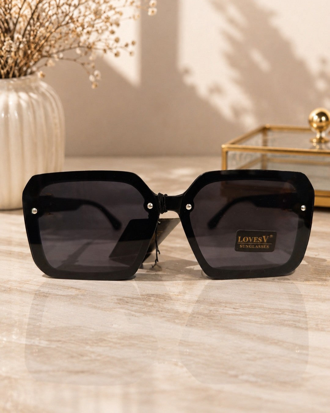 L043 LENTES DE SOL